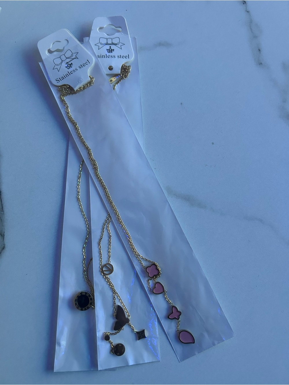 & Other Stories Gold-Tone Layered Charm Necklace Set with Pink Enamel